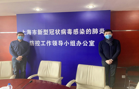民兵队员（左起）贾尧、蒋仕贤赴上海市新型冠状病毒感染的肺炎疫情防控工作综合协调组参与工作.jpg